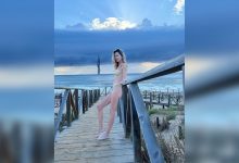 Фото - Женя Малахова снялась в бикини телесного цвета на берегу моря